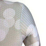 Close-up of a Tri Suit material with a subtle pattern on a white background