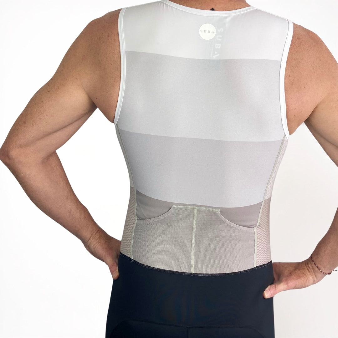 Person wearing a white Tri Suit on a white background