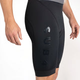 Black Tri Suit legs with a brand logo on a white background