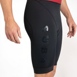 Black Tri Suit legs with a brand logo on a white background